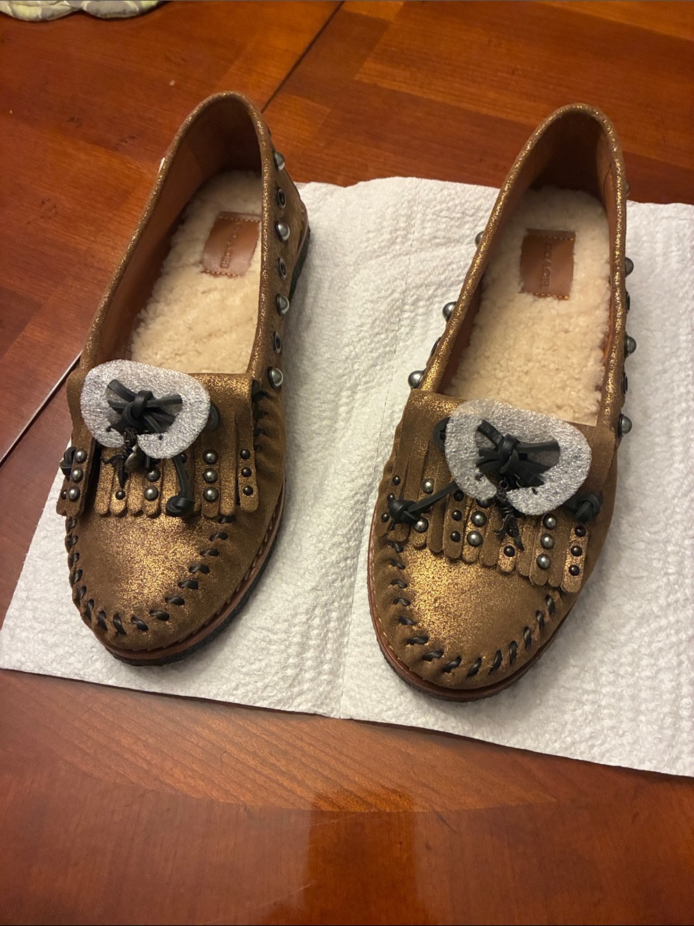 Coach Metallic Bronze Shearling Moccasin Loafers & Tassel Detail. size 7.5 NWOT